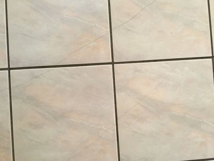 q cracked floor tile repairs