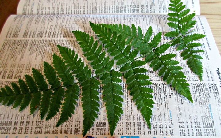 using pressed leaves to decorate candles
