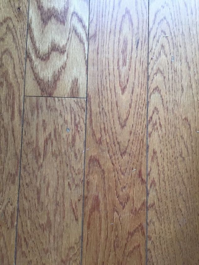 q how can i clean my wood floors they only have a thin layer of wood