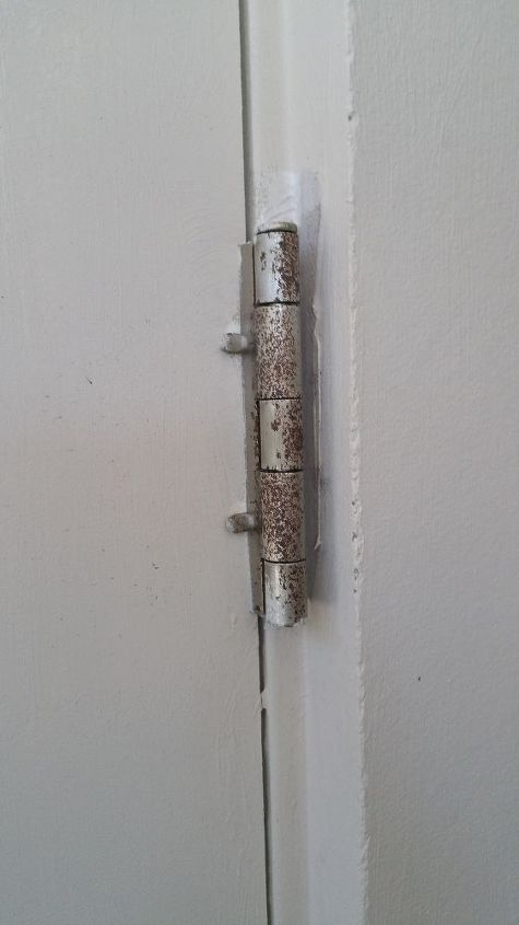 q how to remove rust from exterior door hinges without removing them