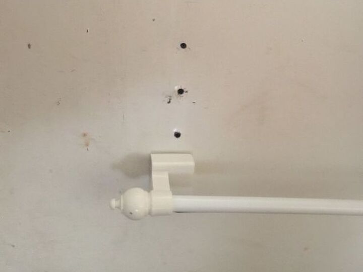 q how to repair holes in a metal front door