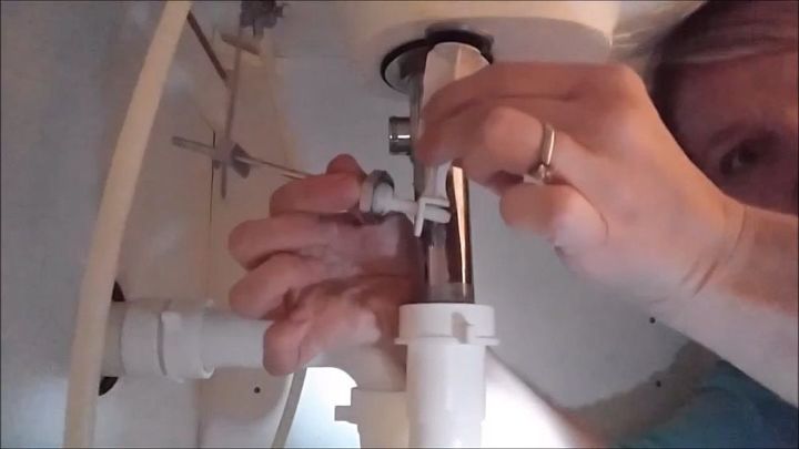 clearing a clogged sink drain and rescuing lost jewelry