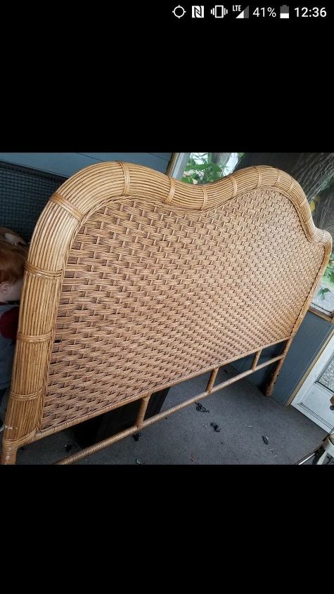 q covering a wicker headboard