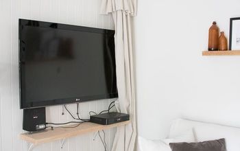  A maneira mais fácil de esconder uma TV quando você não a quer na lareira