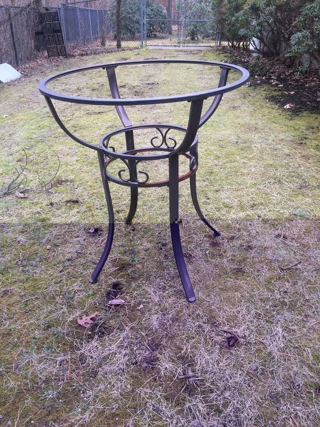 q found this abandoned patio bar table no glass in a field any ideas