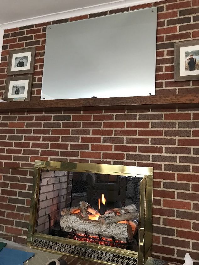 q how do you hang a tv on brick above the fireplace
