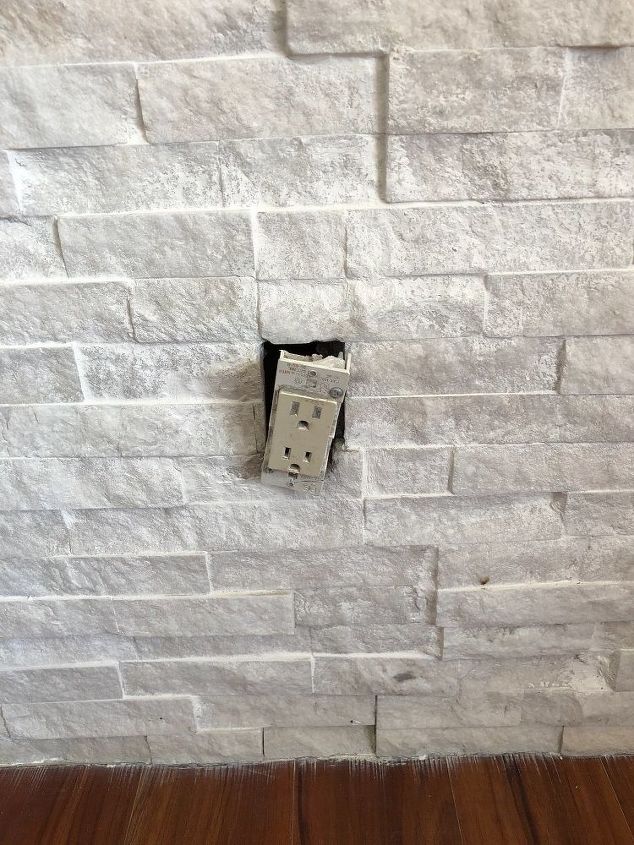 electric outlets on stone wall