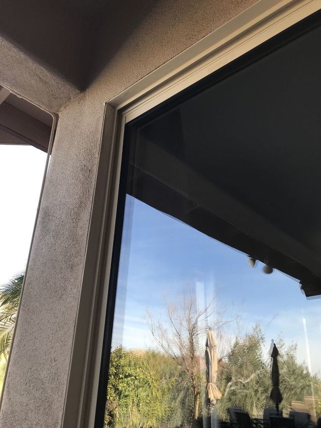 how to remove hard water stains on your windows or shower glass