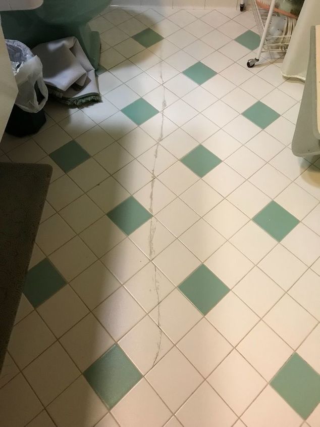 cracked bathroom floor tiles is there a way to repair