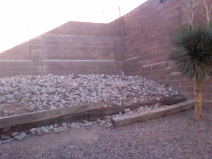 q what is the best way to hold up sloping backyard for terraced garden