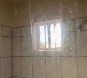 q how to eliminate daily water spots on clear showers curtain