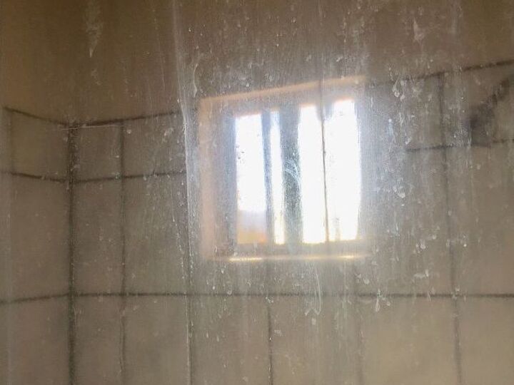 q how to eliminate daily water spots on clear showers curtain