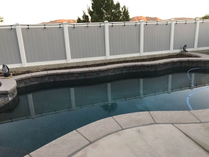 q any ideas for landscaping behind our pool no plants in the ground