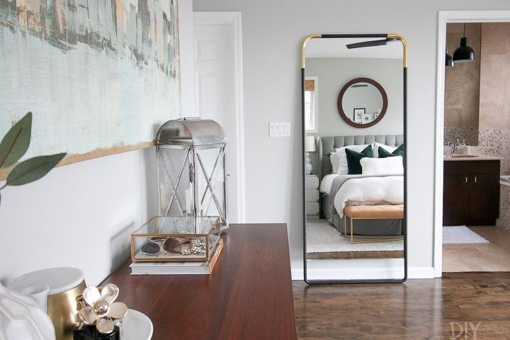 how to secure a standing mirror to the wall