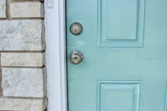 painting my front door a pretty light blue