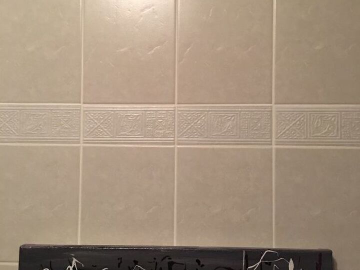 q how to hang a print lower than the hook