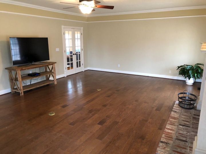 q help me design and furnish this long living room