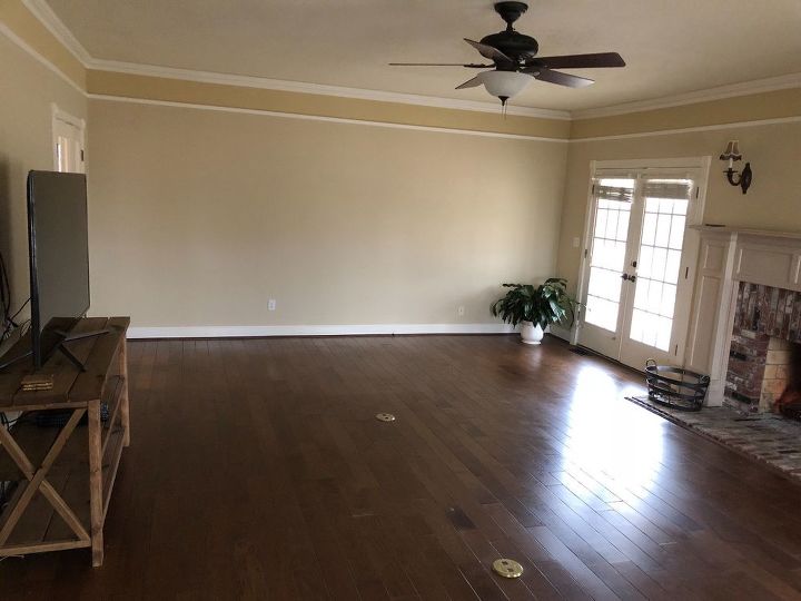 q help me design and furnish this long living room