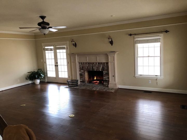 q help me design and furnish this long living room
