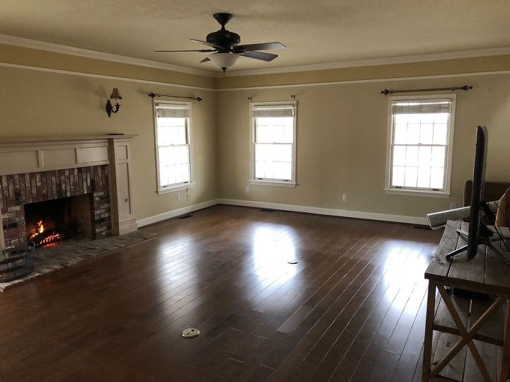 q help me design and furnish this long living room