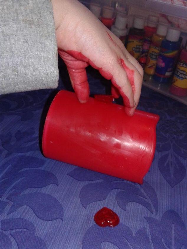 dollar tree valentine s hands hearts, Adding red gems to the candle