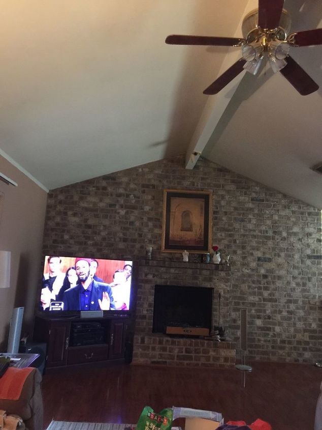 q i have a brick wall with fireplace how can i make it more updated