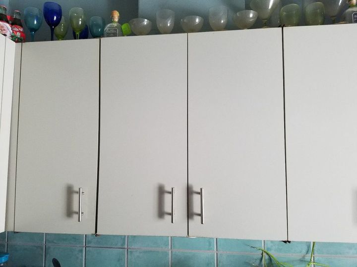 q how can i update kitchen cabinets without replacing them can t afford