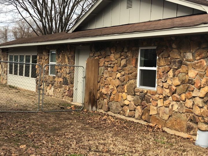 buying 1970s house made with a lot of field stone needs cleaning
