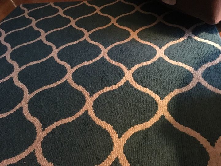 q i have a blue white rug do you think i could paint those white designs