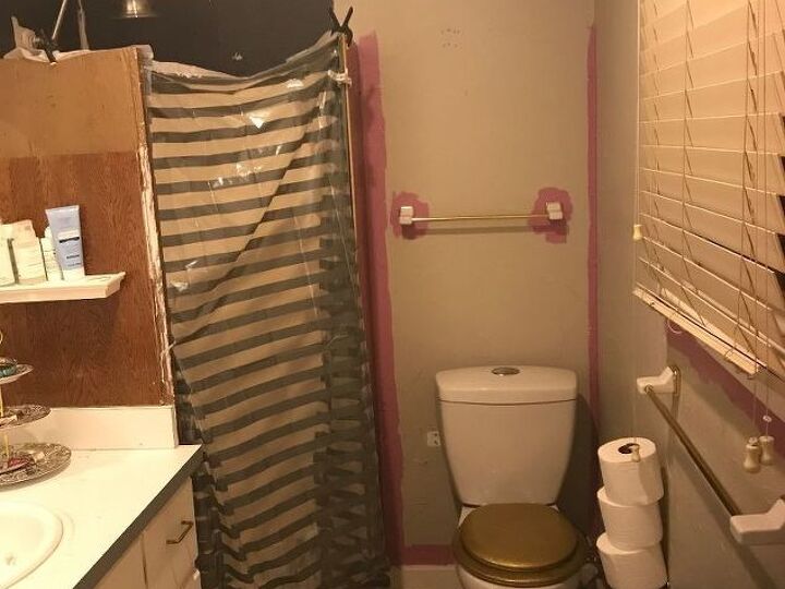 q i have a triangular shower that was installed wrong