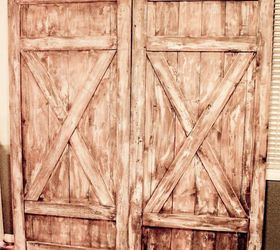 a farmhouse style barn door headboard