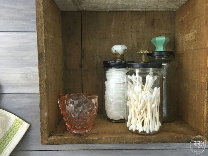 s 25 ways to use those pickle jars you ve been saving, Easy bathroom storage