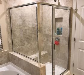 q what s the best way to clean the glass shower door and walls in my n