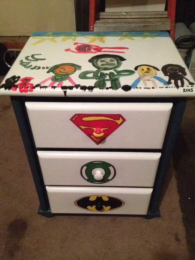 our son s dresser and night table splatters and super heroes