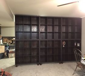 a wall of shelves using store bought shelf organizers