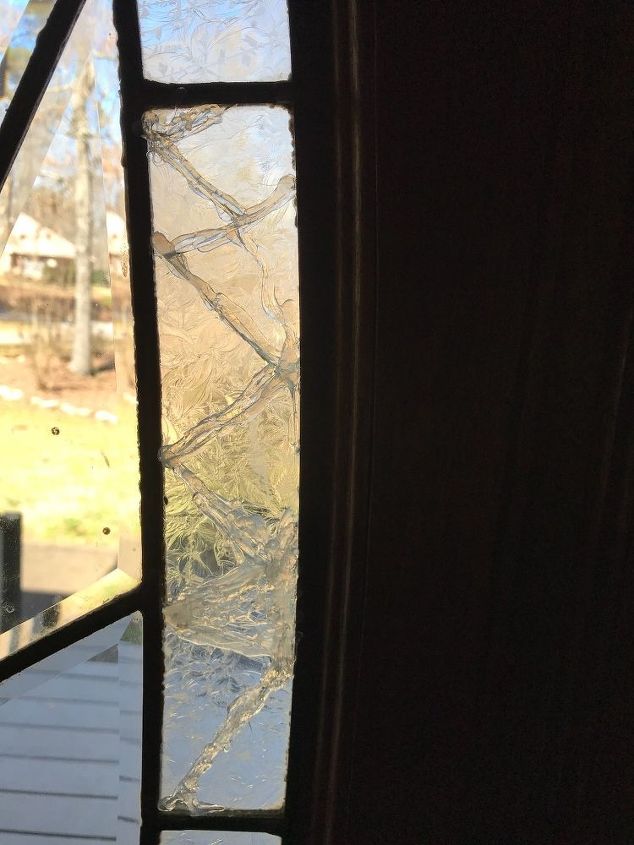 q how do i go about replacing a broken panel of glass on a front door