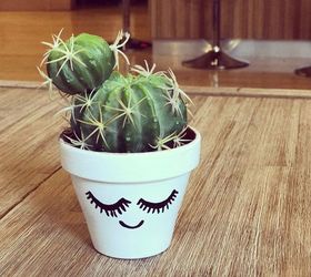 s 22 idea to make your terra cotta pots look oh so pretty, Give them personality with eyelashes