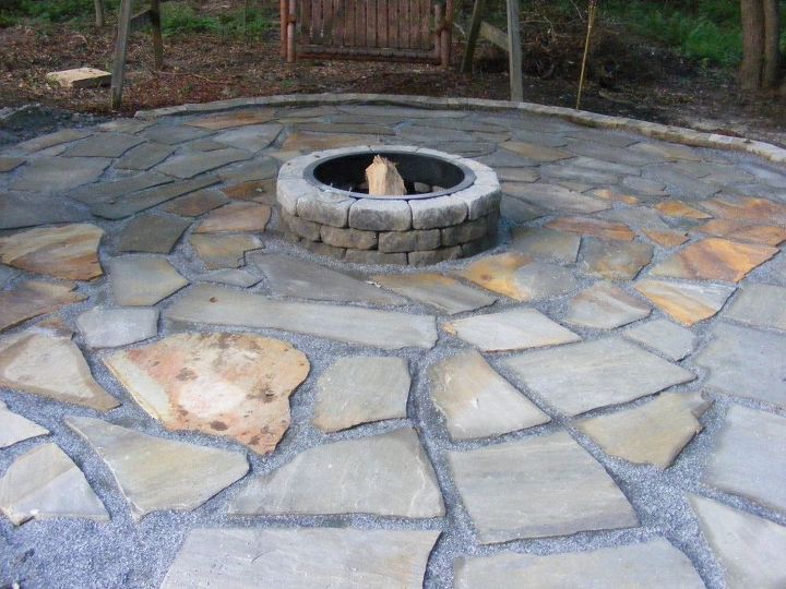 upgrade your backyard with these 30 clever ideas, Decorate your patio with a flagstone fire pit