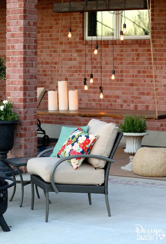 upgrade your backyard with these 30 clever ideas, Add a stylish hanging table to your backyard
