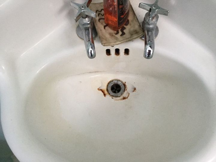 q can a 1940 corner porcelain over cast iron rusted sink be repaired