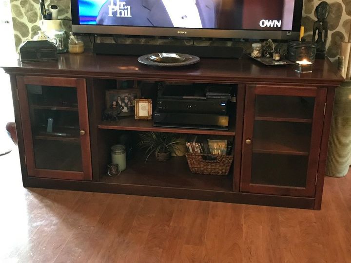 q decorating around a large flatscreen tv