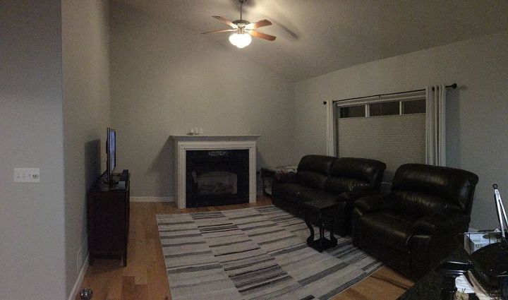 q need advice on how to decorate walls that have a high angled ceiling