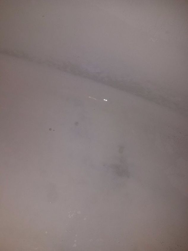 q how can i get the stains out of my tub