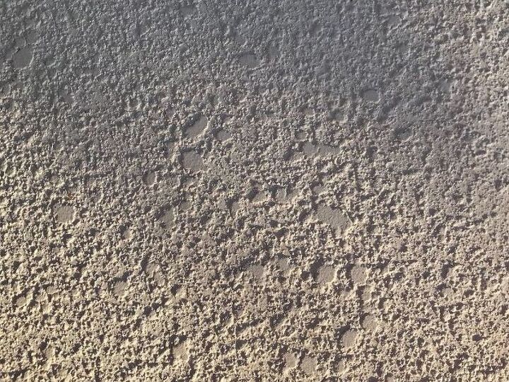 q my pool deck is very rough and hurts your feet to walk on it
