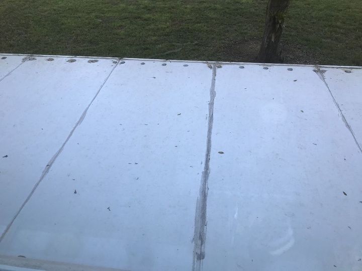q how can i beautify a white vinyl roof top my condo overlooks