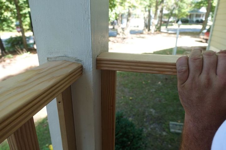 diy front porch railing replacement project, Setting the top rail into place