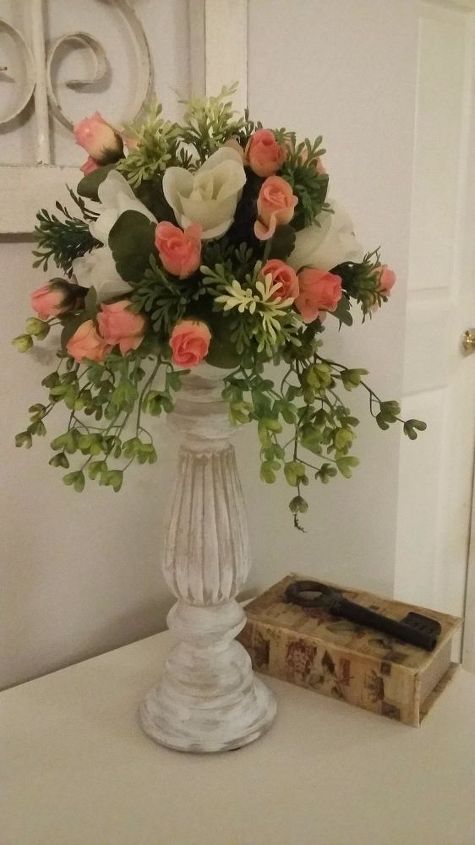 cute flowers arrangement on a candle holder