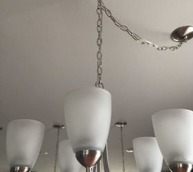 covering up a hook holding chandelier