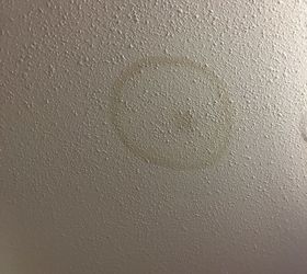 we have an old water stain on our ceiling how do i cover it