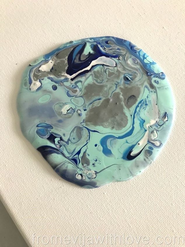 create a unique piece of art using acrylic pouring technique